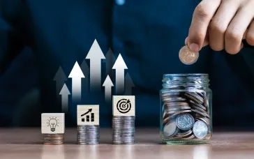 Businessman using tablet analyzing sales data and economic growth graph chart. Business strategy. Abstract ico
